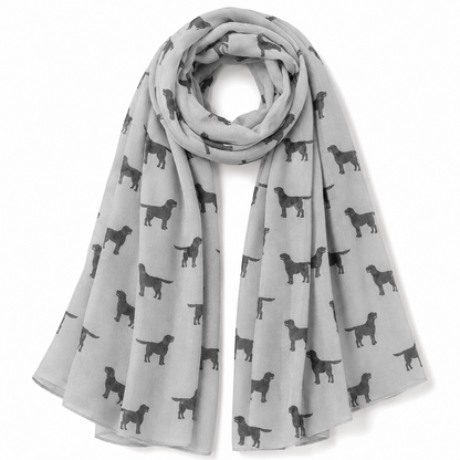 Grey scarf with black Labrador dog pattern on a white background