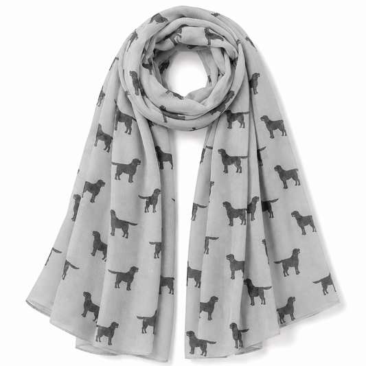 Grey scarf with black Labrador dog pattern on a white background