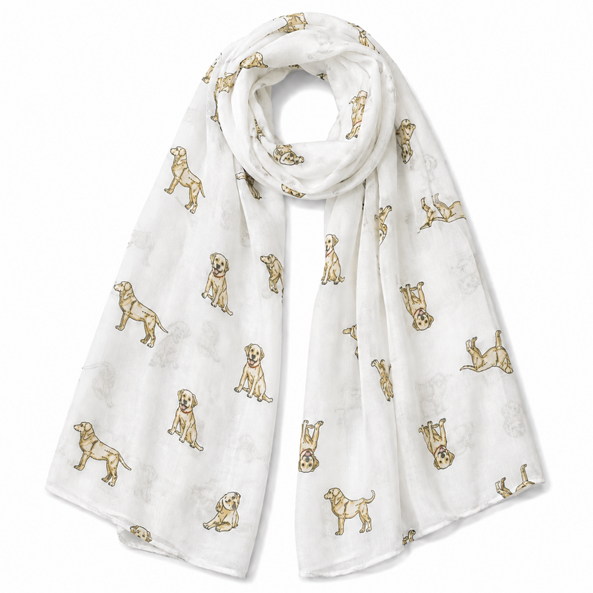 A lightweight white scarf featuring an all-over print of Labrador retriever dog illustrations in a light tan colour, arranged in a draped studio presentation on a white background.