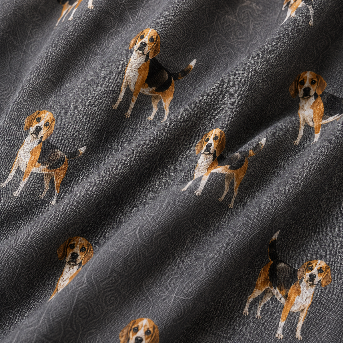 Close-up of grey patterned scarf with repeated beagle dog illustrations in tan, white, and black.