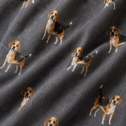 Close-up of grey patterned scarf with repeated beagle dog illustrations in tan, white, and black.