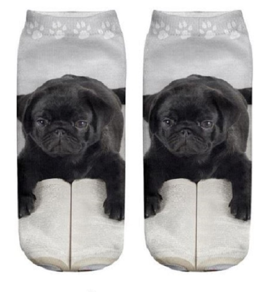 Two socks with a cute black pug dog design on a white background