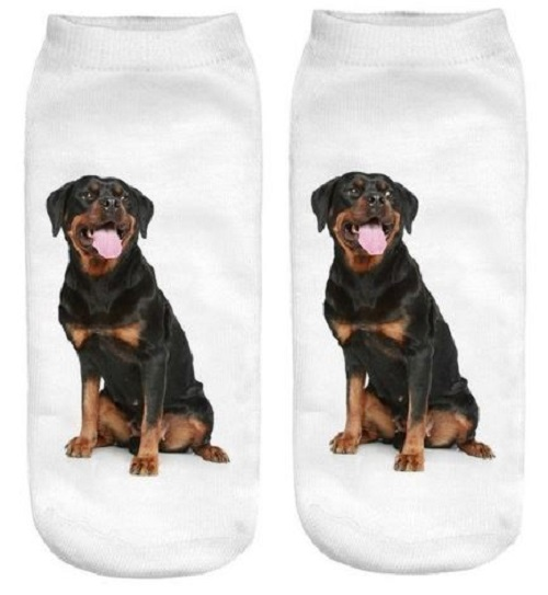 Two socks with a Rottweiler dog design on a white background