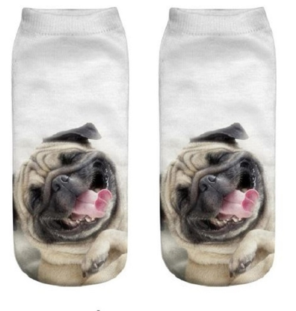 Two socks with a smiling pug dog design on a white background