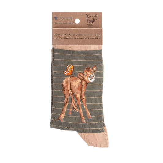 Sock with cow design on a white background