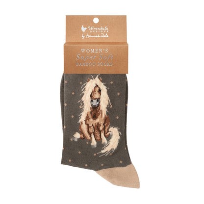 Sock with horse design in packaging on a white background