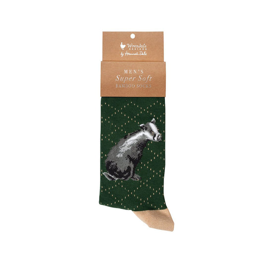Green sock with badger design and packaging on a white background