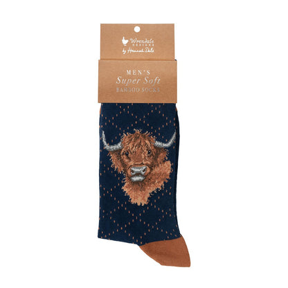 Men's sock with highland cow design on packaging