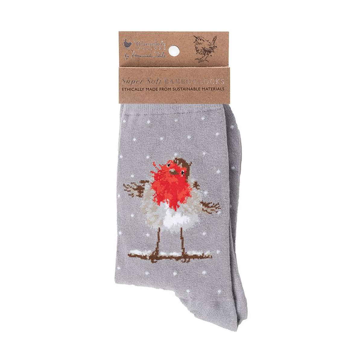 A pair of grey knit socks in retail packaging with a brown paper header card. The socks feature a printed design of a robin bird with a bright red breast, white feathers, and brown details, standing on a branch against a snowy background with white dots.
