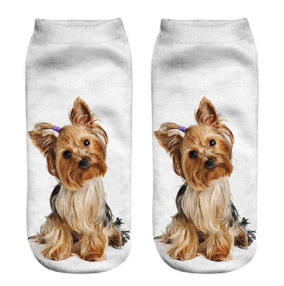 Two socks with a Yorkshire Terrier dog print on a white background
